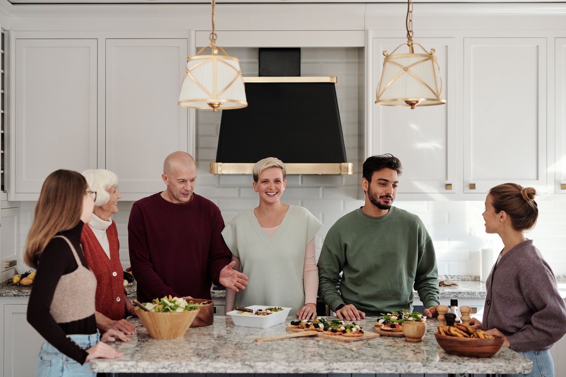 Family enjoying a completed GeoBrix kitchen renovation